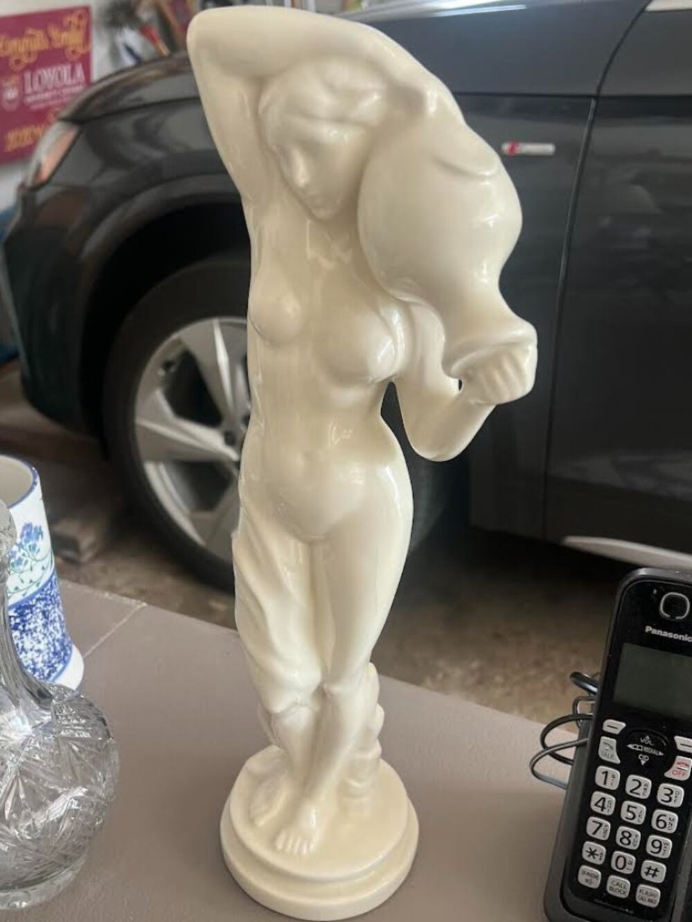 Woman Holding Vase Figurine White